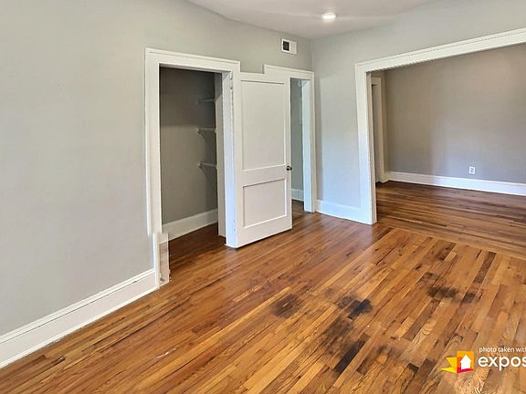 Living room and dining room / home office area.