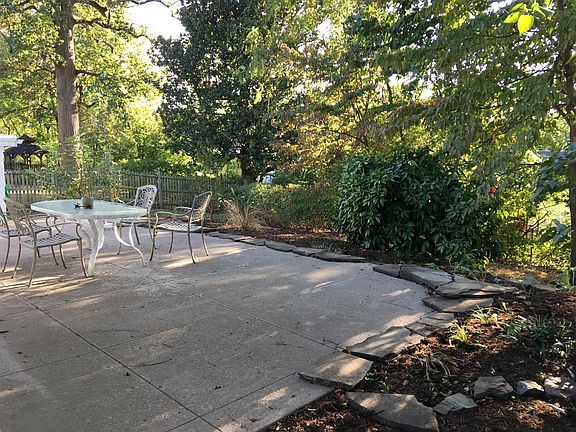 Patio and landscaped yard