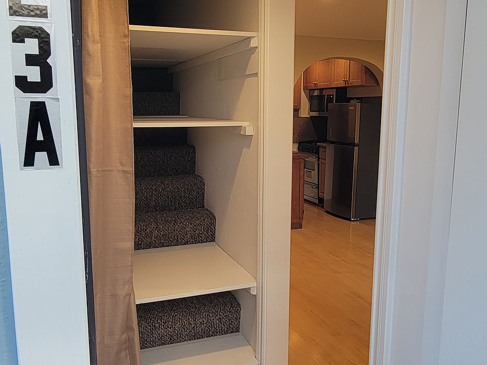 entrance hallway and storage shelves