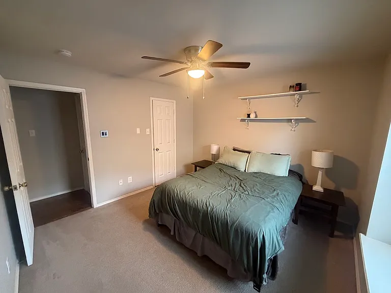 Room #2 with a ceiling fan & a cute window seat to read your fav book