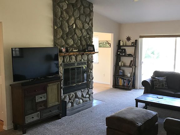 Living rm w stone fireplace