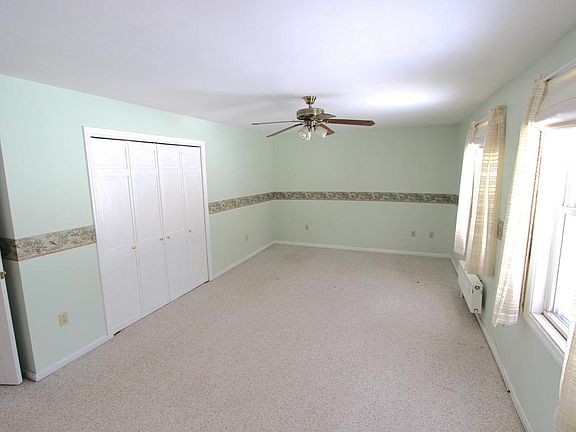 Master bedroom with two walk in closets