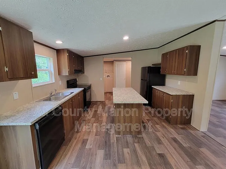 11392 NW 16th Pl — Photo 4
