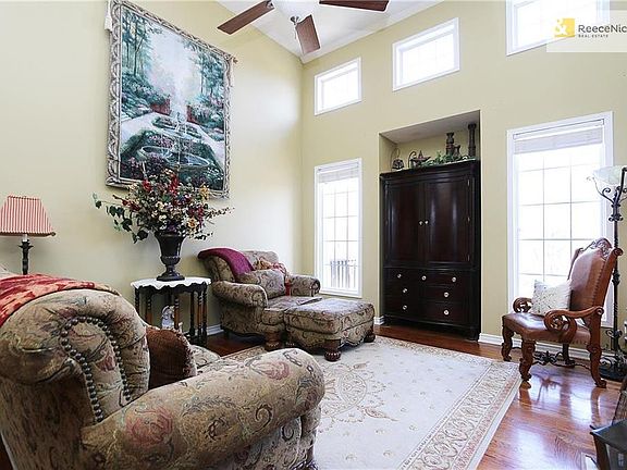 Tall ceilings and lots of natural light in the formal main level living room!