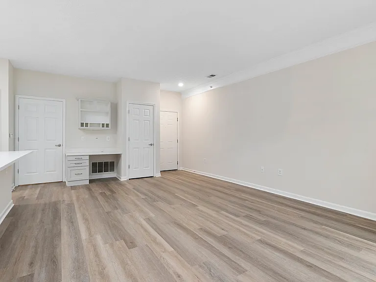 The Charleston Magnolia Premium Renovated Living room with built-in desk with mail center
