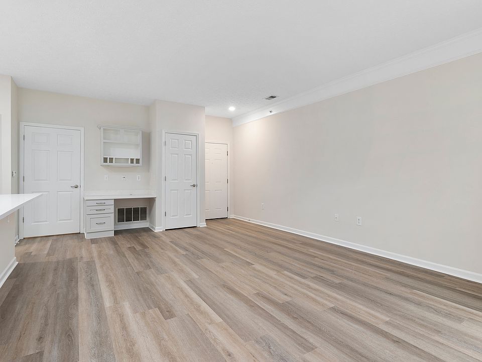 The Charleston Magnolia Premium Renovated Living room with built-in desk with mail center