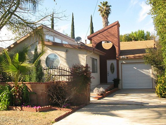 From the mailbox (gate is 22.5 feet away, can park 3 more cars on the left)