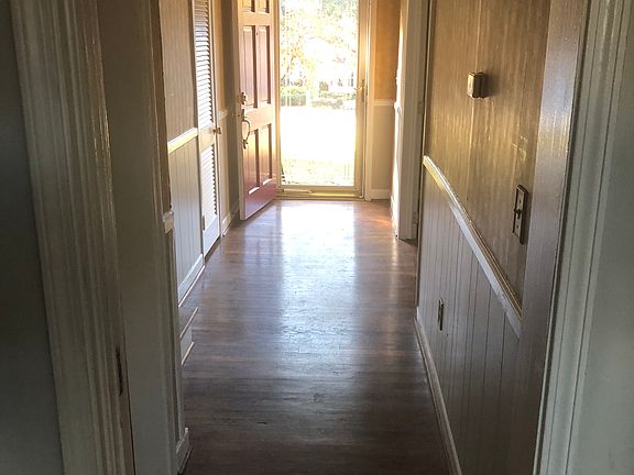 Upstairs hallway to front door