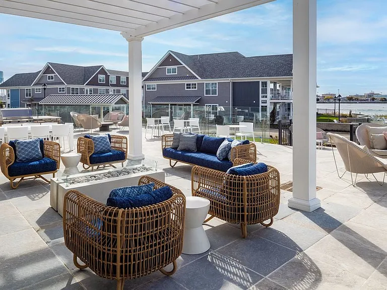 Courtyard with lounge seating and fireplace