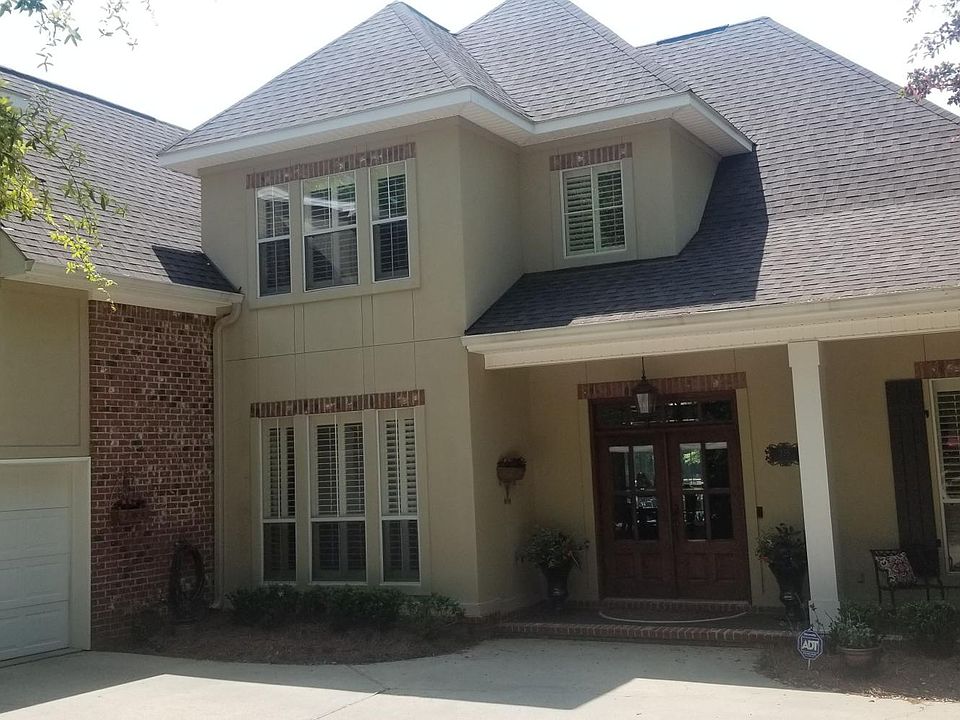 Quiet but kid-friendly neighborhood. Spacious 2-car garage with storage room or golf cart bay. Ample parking in driveway for additional guests.