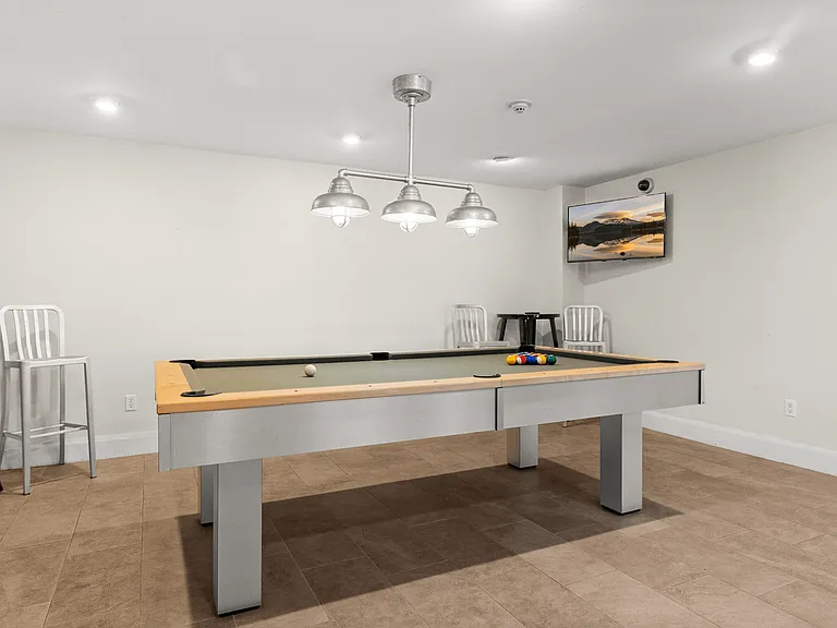 Unwind with a game of pool in the community's stylish recreation room.