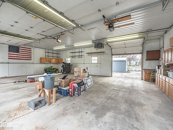 In need of space to work on cars or the ultimate workshop? You'll love this heated 3+ car garage!  B