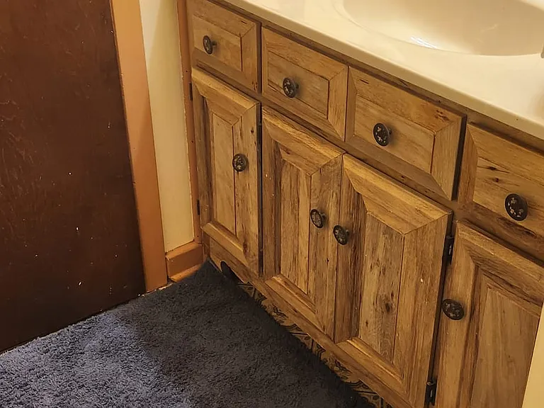 Shared bathroom view of vanity