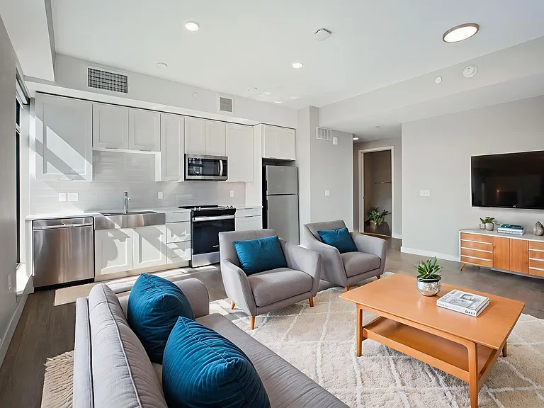 Unwind in a stylish living room with expansive city views.