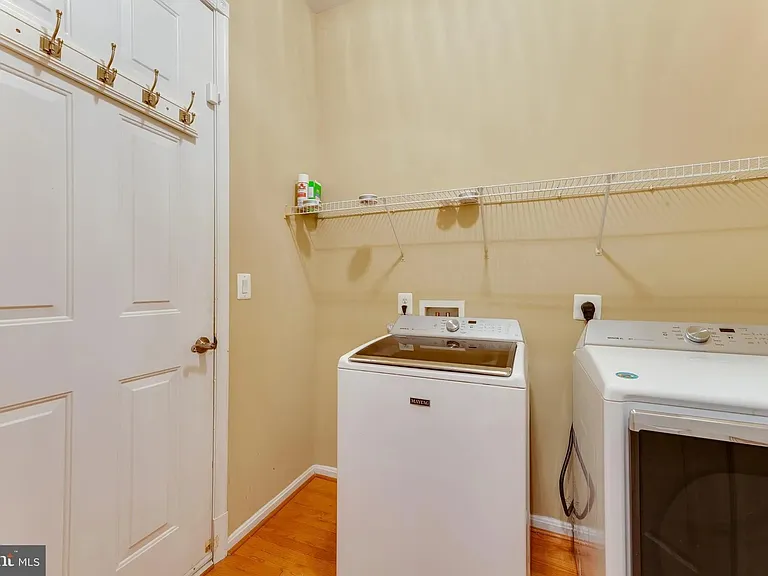 Laundry/mudroom, next to garage door