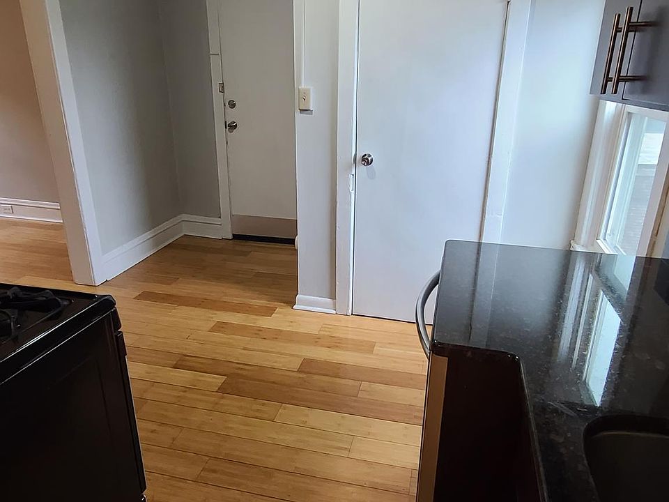 Kitchen with granite counters, stainless steel appliances and dishwasher