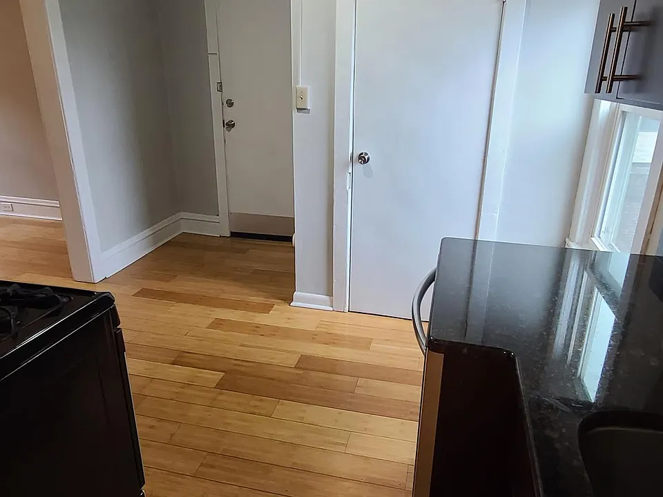 Kitchen with granite counters, stainless steel appliances and dishwasher