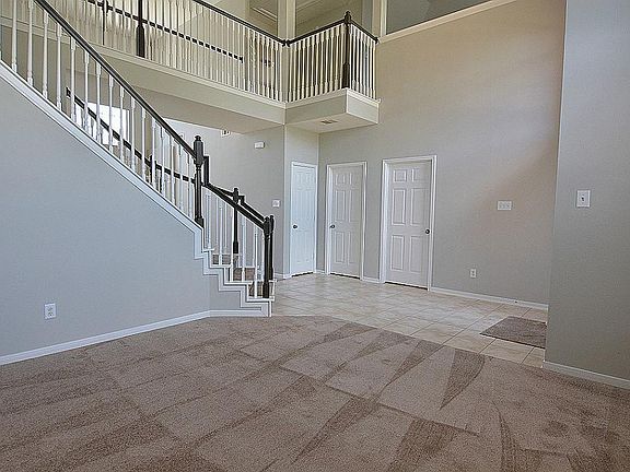This view from the formal living shows the gorgeous stairway and catwalk.