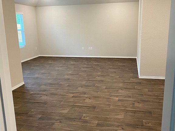 Dining and living area from door of master bedroom