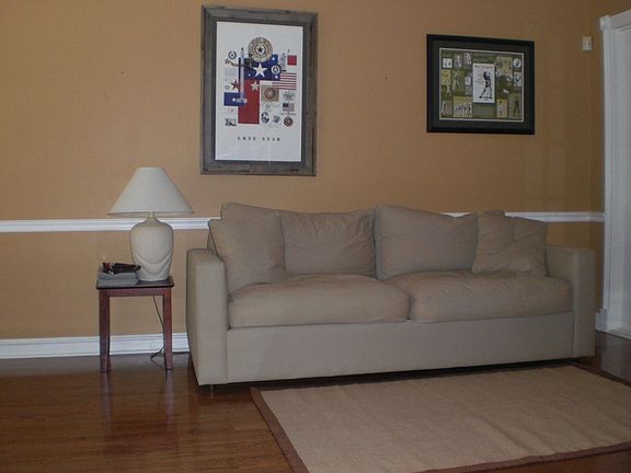 The living room w/beautiful wood floors