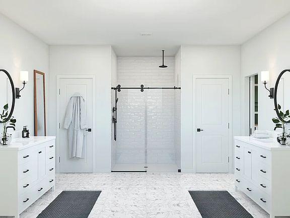 Primary bath with dual vanities and freestanding vanity