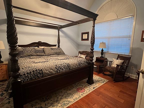 First upstairs bedroom. King bed.