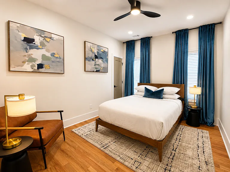 Welcome to the Velvet Room. This cozy queen room exudes luxury and relaxation.
