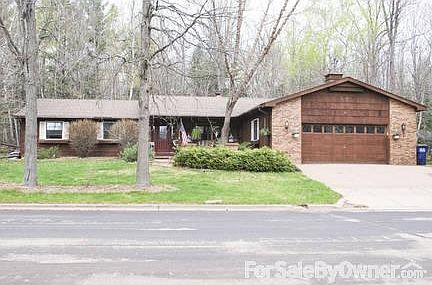 Front Profile
						:
						Brick and Cedar Front with wide porch, columns flanking walkway and paver drive.