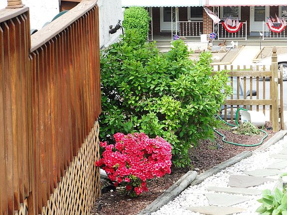 left side of yard entrance