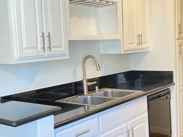 Kitchen with wine rack and dishwasher