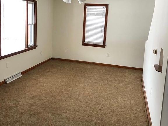 New carpet in living room and freshly painted