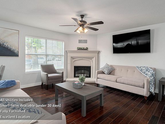 Spacious living room with big screen, Smart TV.