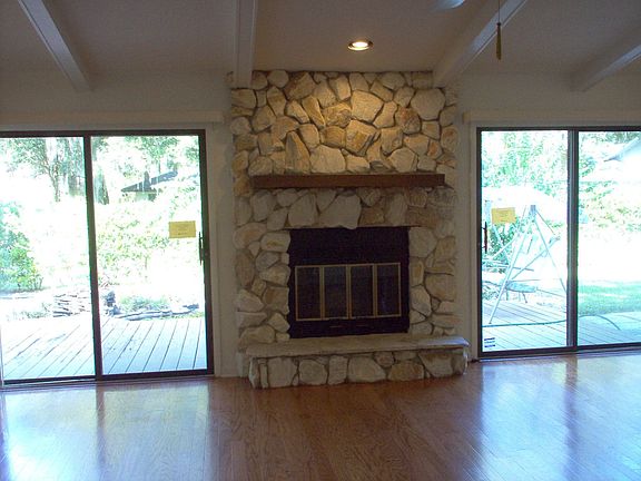 Family Room w/ Woodburning Fireplace