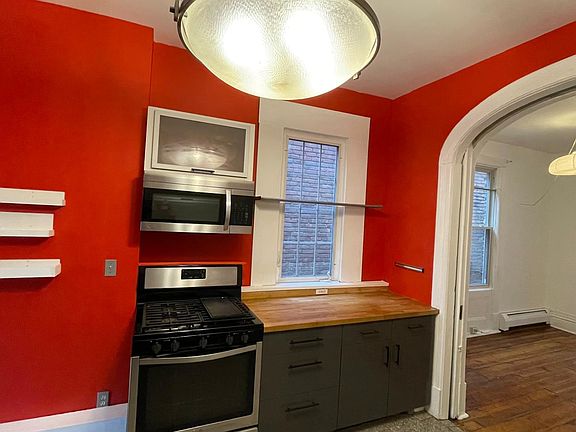 Gas range, microwave with vent and butcher block)