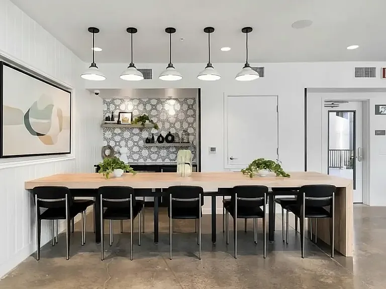 Experience the charm of this contemporary dining area, perfect for gatherings at 805 Riverfront Apartments in Sacramento