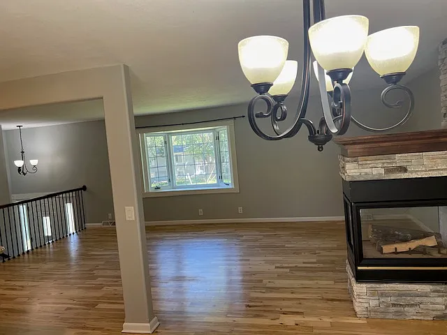 Refinished Solid Maple Floors.