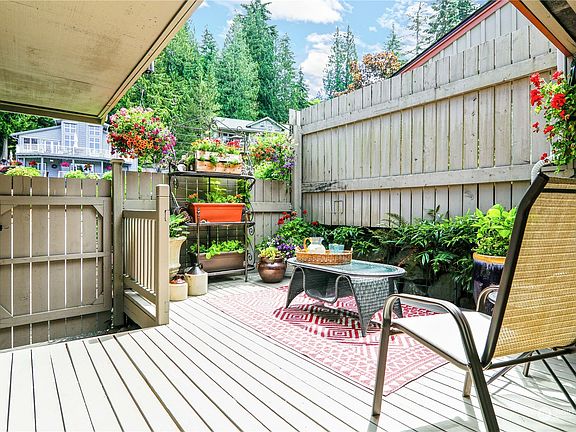Enjoy the privacy and quiet of this large front patio.>