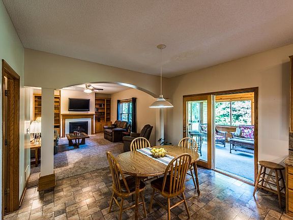 Eating area opens to family room and three season porch.