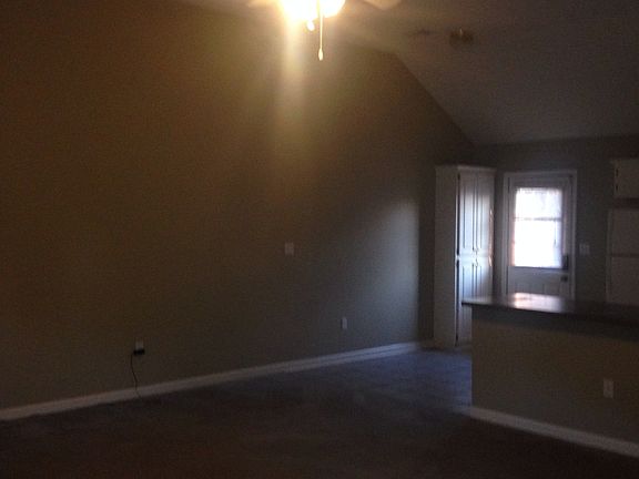 From entrance into house