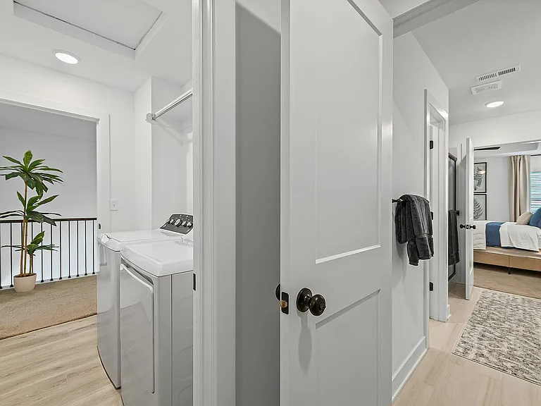 Primary Closet and Bathroom Connected to Laundry