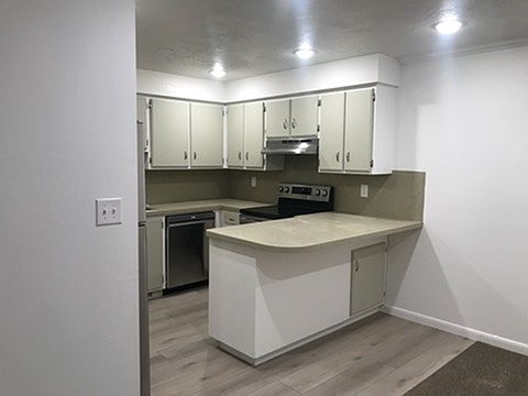 Kitchen, new flooring and appliances, new lighting.