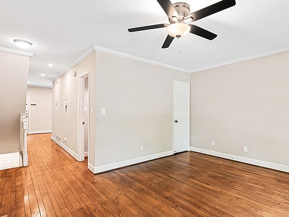 Spacious living area on second level overlooking street