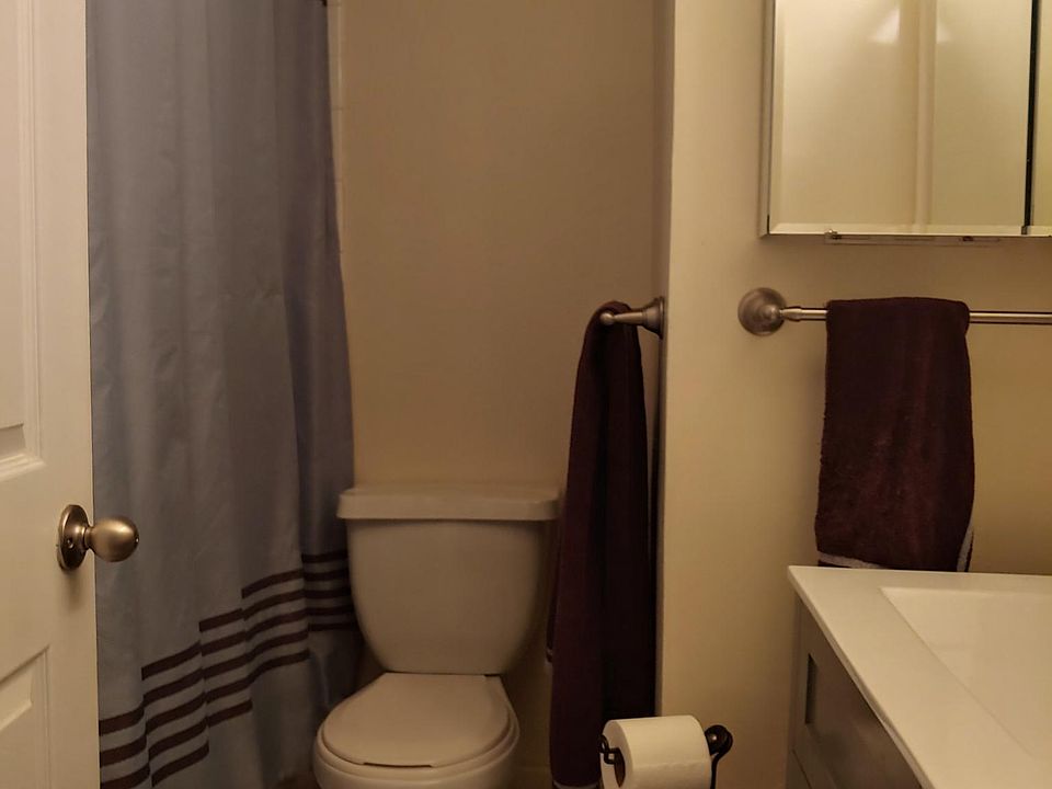 Bathroom view, full shower/tub