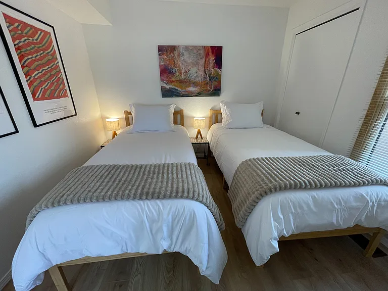Upstairs bedroom in 2 twin XL configuration.