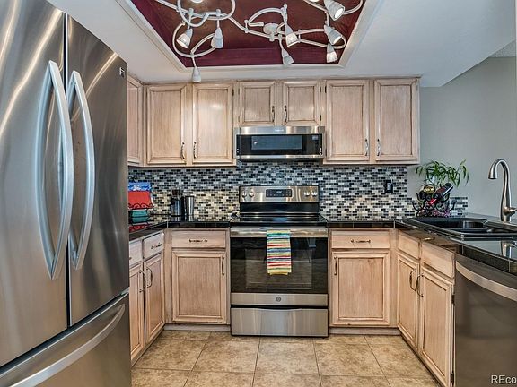 Stainless appliances & upgraded tile back splash.