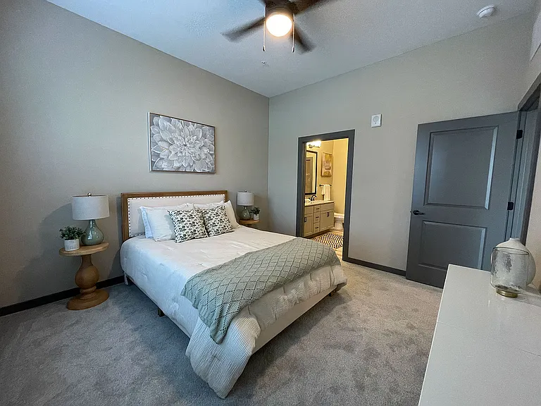 Experience restful nights in this serene and chic bedroom oasis.