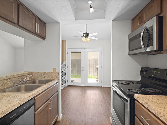 Kitchen w stainless steel appliance package.