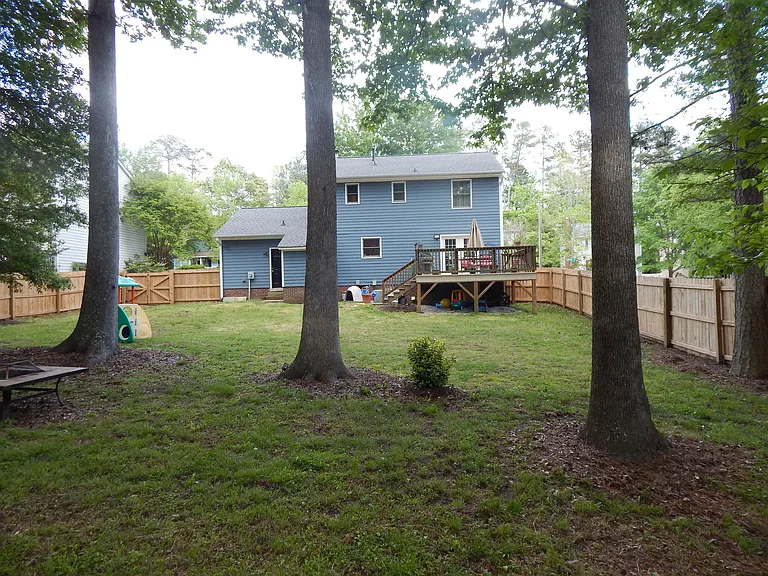 Large fenced back yard.