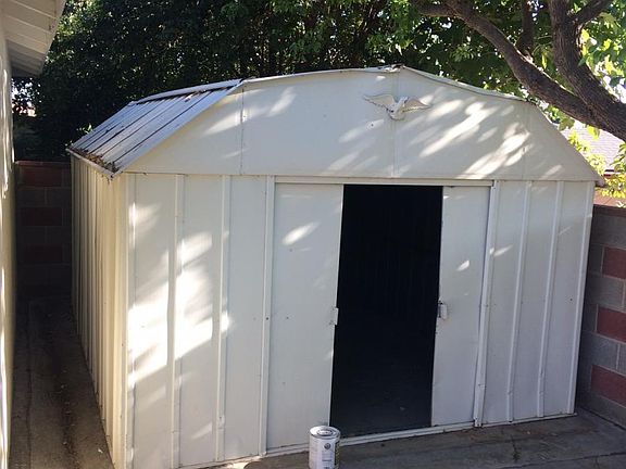 Storage Shed behind Garage