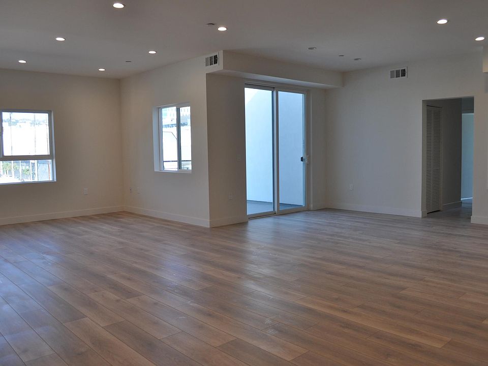 Unit 402 (3-bedroom) Living/Dining. Layout differs per unit